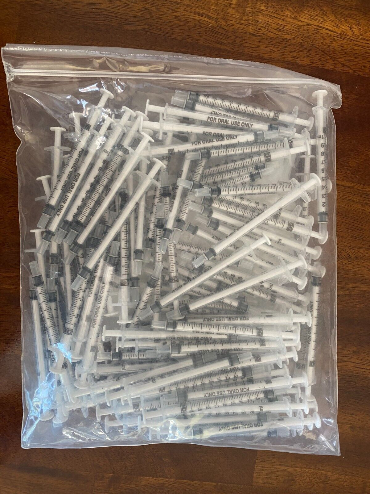 100 Pack BD Oral Dispensing Syringe 1 Ml Clear with Tip Cap BAG 100 Non-Sterile